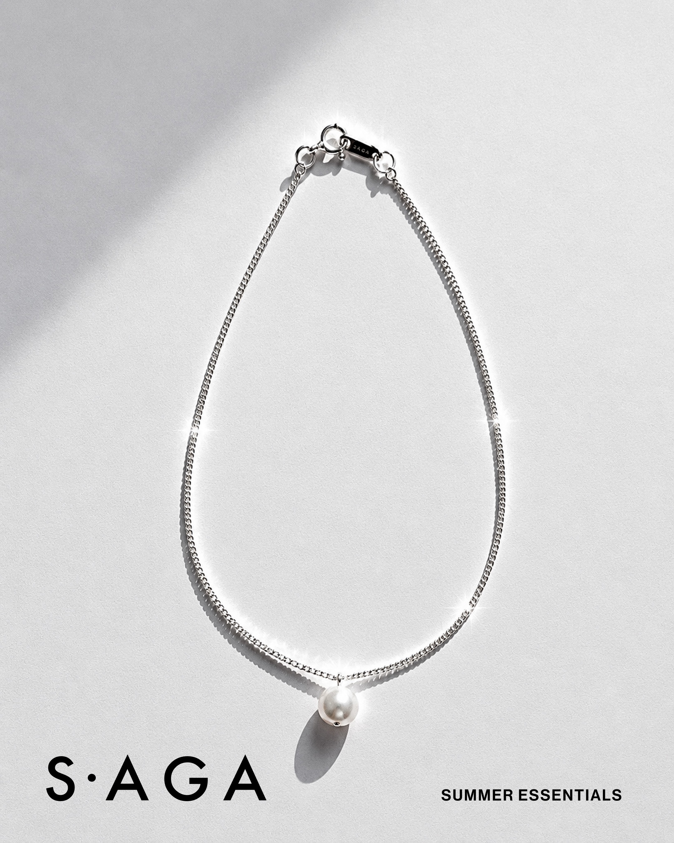 A single freshwater pearl in sterling silver-
for city mornings, salty afternoons, and warm evenings.